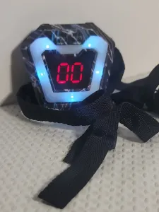 White Electronic Device with Black Woven Strap