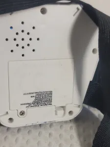 White Electronic Device with Black Woven Strap